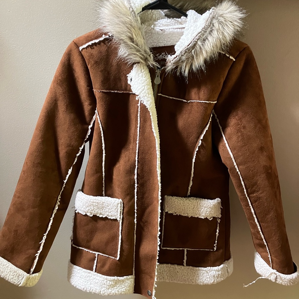Justice size 12/14 kids jacket.  Like new. Brown with cream sherpa lined inside.